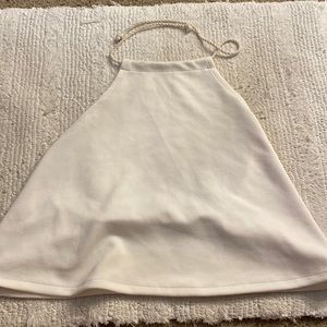 White top. Ties at the tops very elegant